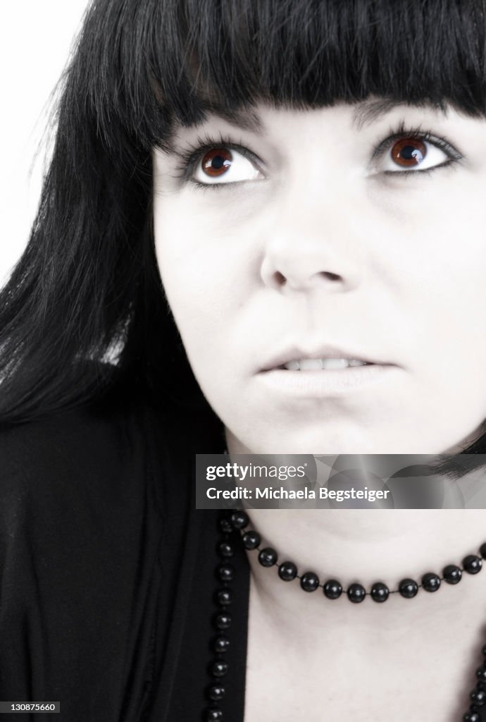 Young, dark-haired woman in portrait