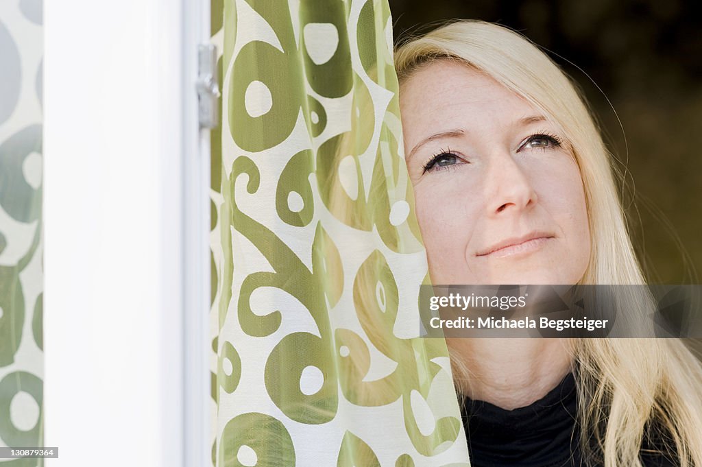 Pensive attractive blonde woman, 35+