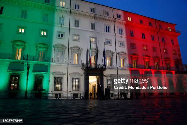The facade of Palazzo Chigi, seat of the Italian government, illuminated with the Tricolor. Rome , March 19th, 2021
