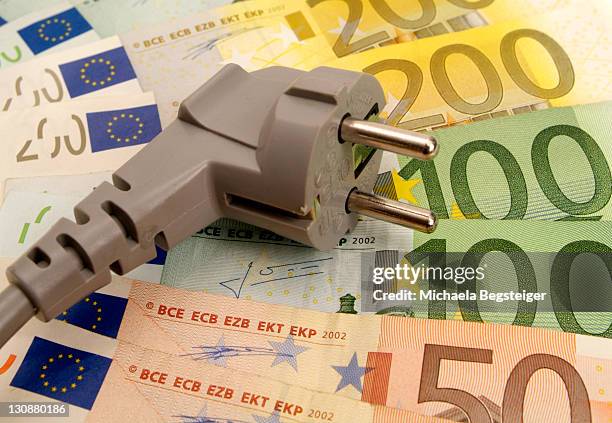 symbolic for electricity costs - tariffs stockfoto's en -beelden