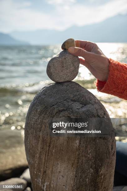 rock stacking photos and premium high res pictures -... Stacking Pebbles Photos and Premium High Res Pictures - Getty Images