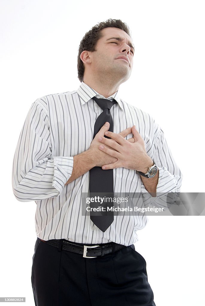 Young businessman with heartache