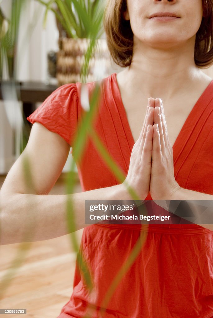Woman does yoga at home