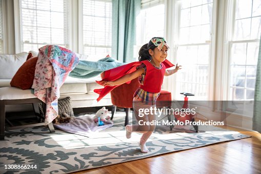 Child playing in homemade costume