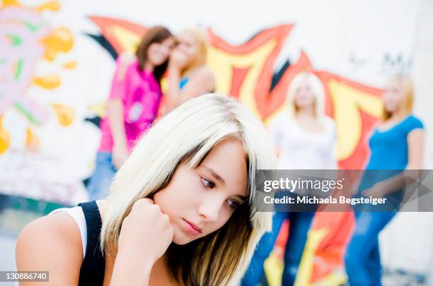 teenage girl being bullied by peers - ostracise stock pictures, royalty-free photos & images