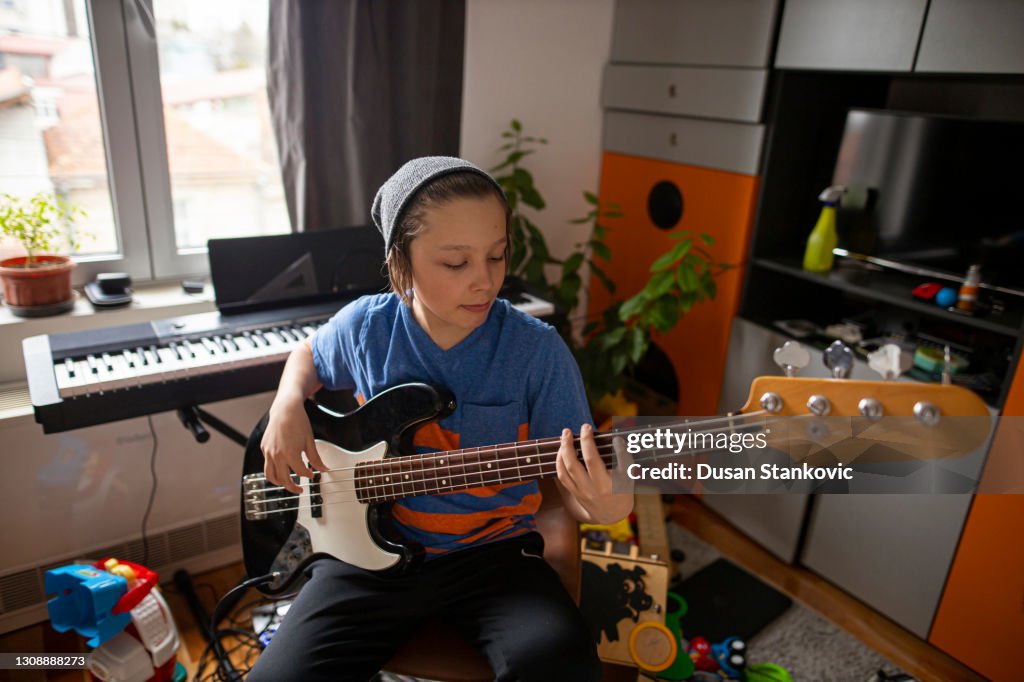 Boy playing guitar