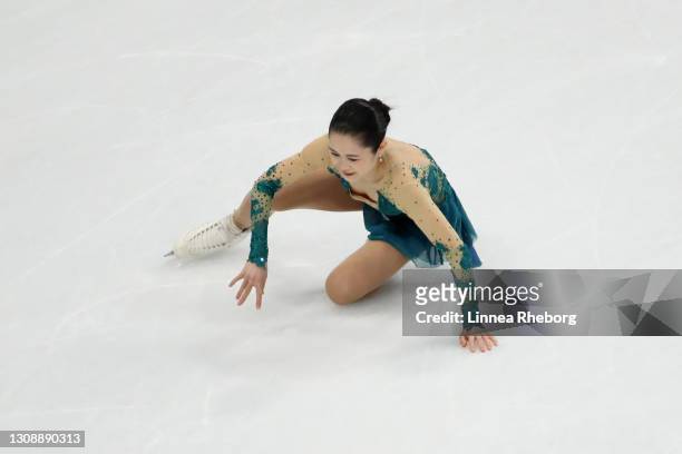 Satoko Miyahara of Japan falls during her performance in the Ladies Short Program during the ISU World Figure Skating Championships at Ericsson Globe...