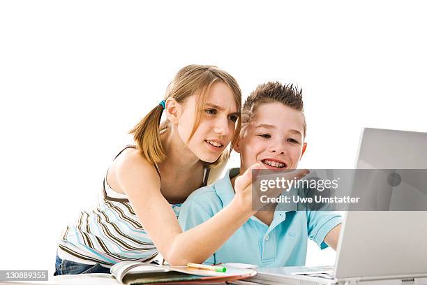 boy and girl learning together with a computer - 10 11 years stock pictures, royalty-free photos & images