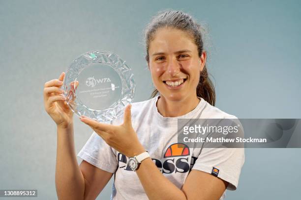 Johanna Konta of Great Britain poses with her 2020 WTA Peachy Kellmeyer Player Service award during the Miami Open at Hard Rock Stadium on March 24,...