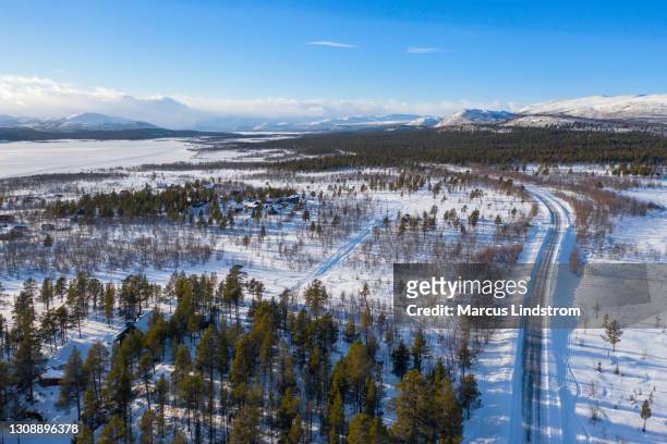 road to the scandinavian mountains - norrbotten province stock pictures, royalty-free photos & images