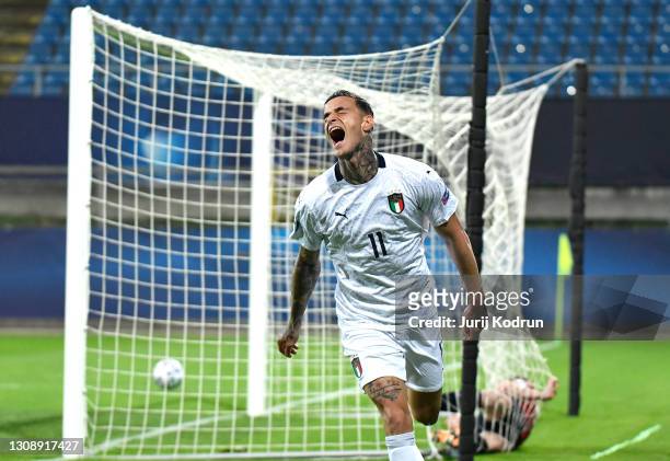 Gianluca Scamacca of Italy celebrates scoring his team's first goal during the 2021 UEFA European Under-21 Championship Group B match between Czech...