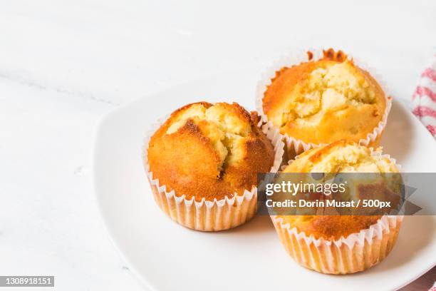 close-up of cupcakes on table - muffins stock pictures, royalty-free photos & images