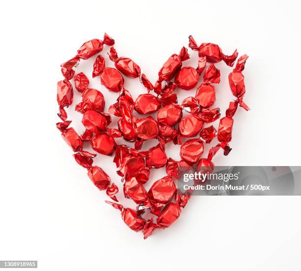 close-up of heart shape over white background - heart candy on white stock pictures, royalty-free photos & images