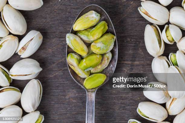 directly above shot of food in bowl on table - pistachio stock pictures, royalty-free photos & images