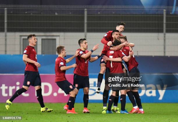 Players of Czech Republic celebrate after Giulio Maggiore of Italy scores an own goal during the 2021 UEFA European Under-21 Championship Group B...