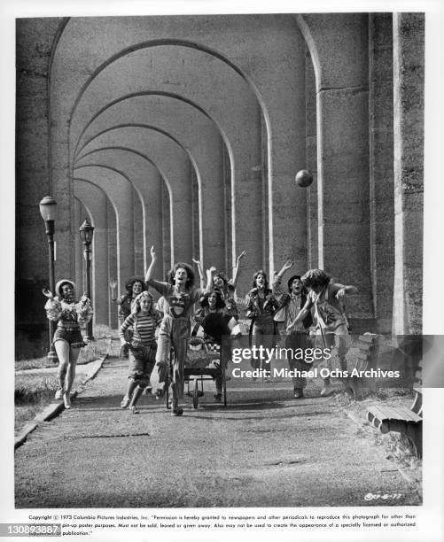 Lynne Thigpen, Robin Lamont, Katie Hanley, Victor Garber, Joanne Jonas, David Haskell, Jeffrey Mylett, and Jerry Sroka performing under arches in a...