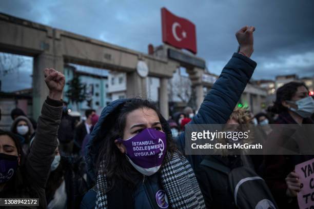 People chant slogans during a protest against Turkey's decision to withdraw from the Istanbul Convention on March 24, 2021 in Istanbul, Turkey....