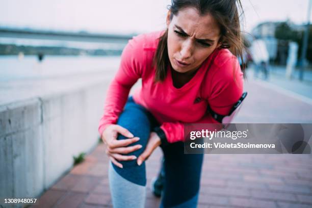 sport injury - knee stock pictures, royalty-free photos & images