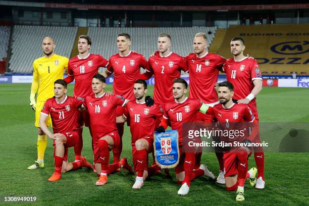 Serbia pose for a team photo prior to the FIFA World Cup 2022 Qatar qualifying match between Serbia and Republic of Ireland on March 24, 2021 in...