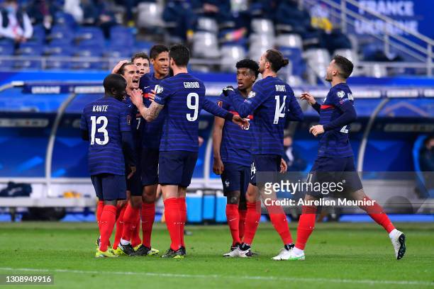 Antoine Griezmann of France celebrates with team mates after scoring their side's first goal during the FIFA World Cup 2022 Qatar qualifying match...