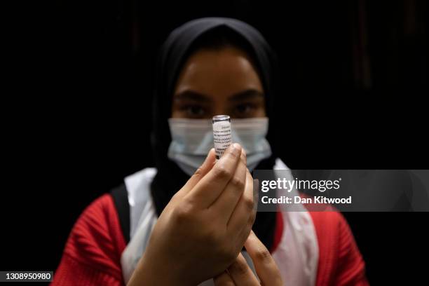 Nurse prepares the AstraZeneca jab at East London Mosque on March 24, 2021 in London, England. After weeks of tensions over Covid vaccine supplies,...