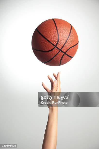 hand&basketball,hands close-up - basketball close up stock-fotos und bilder