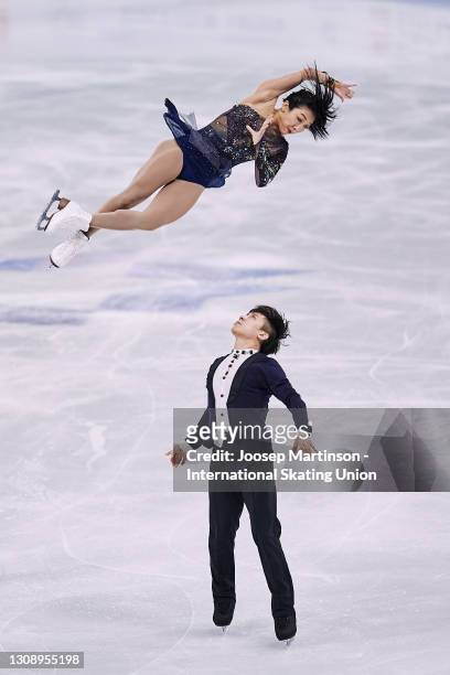 Wenjing Sui and Cong Han of China compete in the Pairs Short Program during day one of the ISU World Figure Skating Championships at Ericsson Globe...