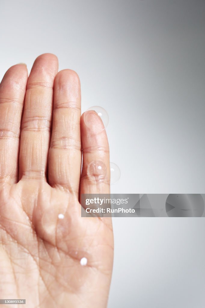 Soap bubbles&hand,hand close-up