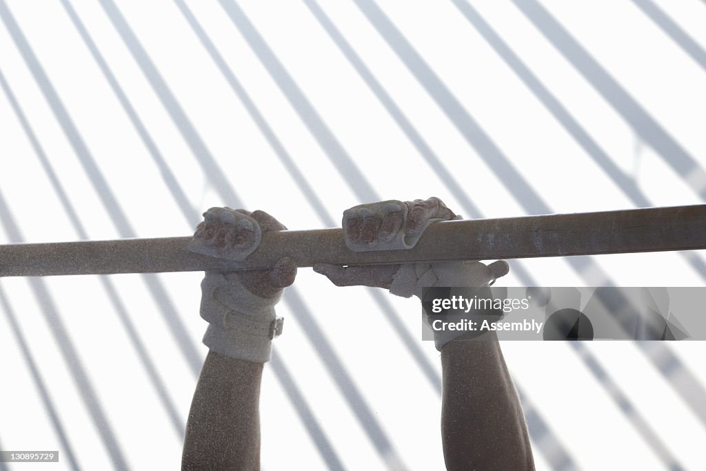 Gymnast's hands on horizontal bar