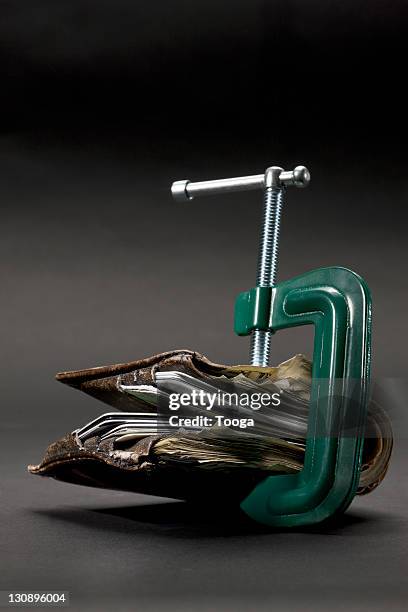 clamp on men's wallet - contracting stock pictures, royalty-free photos & images