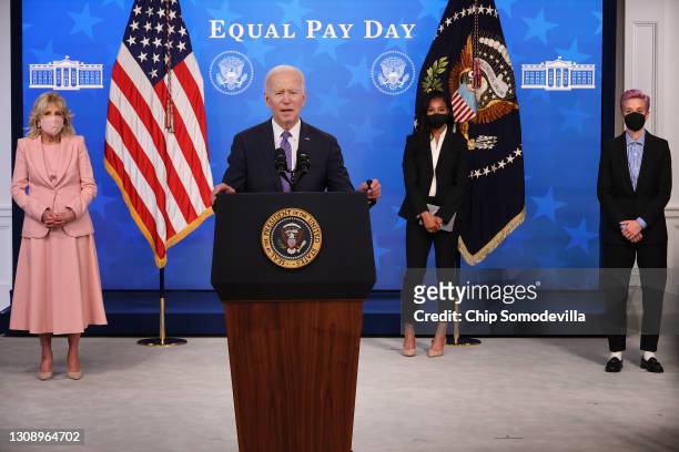 President Joe Biden delivers remarks during an Equal Pay Day event with first lady Jill Biden and soccer superstars Margaret Purce and Megan Rapinoe...