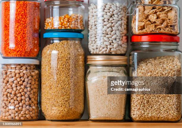 shelf in kitchen pantry with legumes - cereal boxes stock pictures, royalty-free photos & images