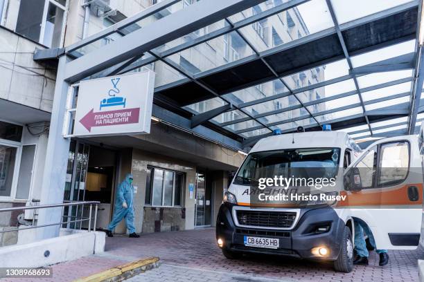 An ambulance transfers a patient with coronavirus disease to a hospital on March 24, 2021 in Sofia, Bulgaria. Bulgaria reported 4,851 new infections...