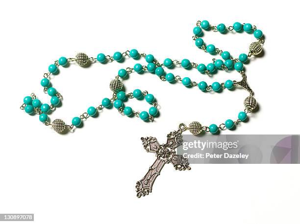 turquoise rosary on white background - gebetskette stock-fotos und bilder