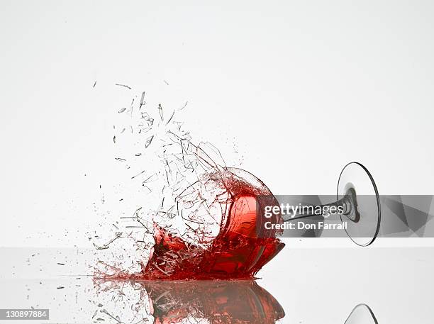 wine glass breaking - glass shatter stock pictures, royalty-free photos & images