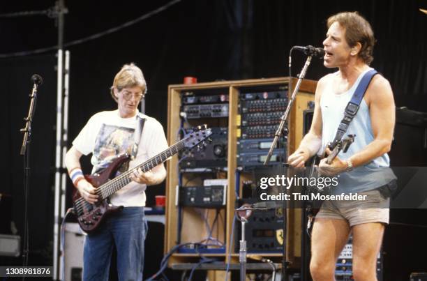 Phil Lesh and Bob Weir of the Grateful Dead perform at Shoreline Amphitheatre on August 26, 1993 in Mountain View, California.