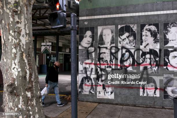 View of a graffiti that reads "Pardon Videla" in reference to the Argentine dictator Jorge Rafael Videla displayed at the door of the Club Ferro...