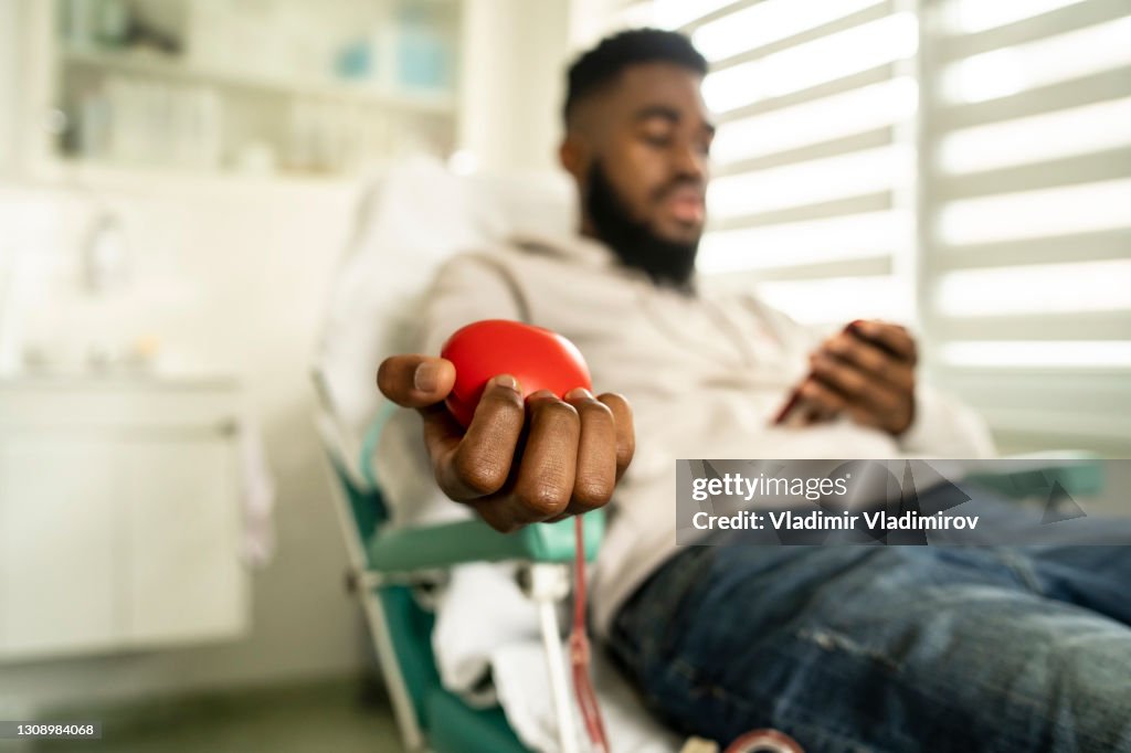 Young man donating blood