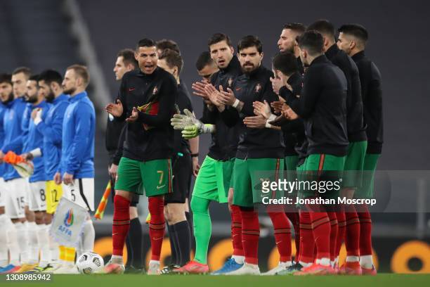 Cristiano Ronaldo of Portugal and team mates gear up for the kick off following the national anthems the FIFA World Cup 2022 Qatar qualifying match...