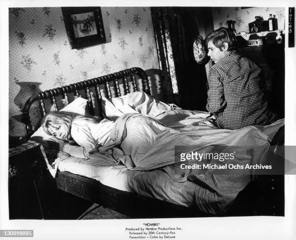 Margaret Blye And Peter Lazer on bed in a scene from the film 'Hombre', 1967.