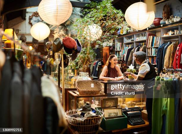 vintage shop worker - antique shop stock pictures, royalty-free photos & images