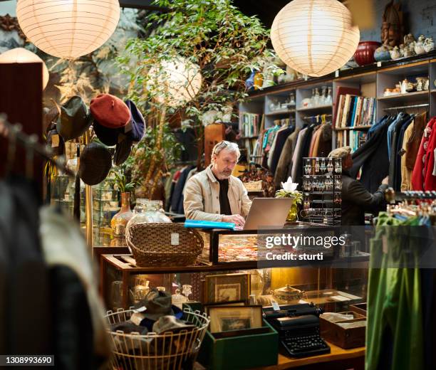 business owner book keeping - antique shop stock pictures, royalty-free photos & images