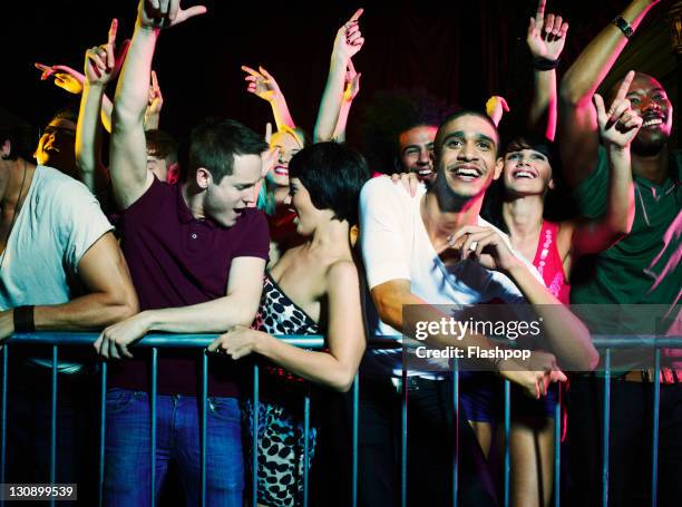 group of people at a music concert - fan concert stock pictures, royalty-free photos & images