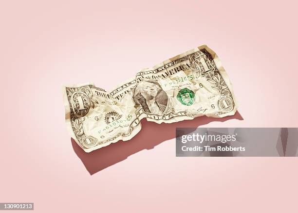 crumpled 1 dollar note. - one dollar bill stock pictures, royalty-free photos & images