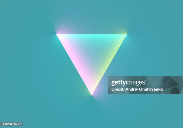 neon triangular shape on blue background. - triangel bildbanksfoton och bilder