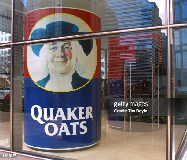 Large box of Quaker Oats is displayed in a first-floor lobby window December 4, 2000 at Quaker''s headquarters in Chicago. PepsiCo Inc. Has struck a...