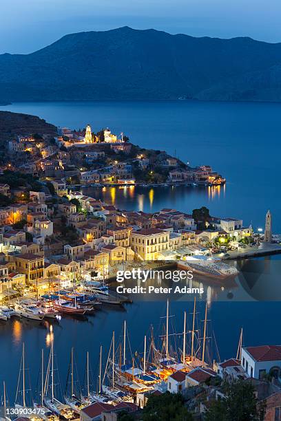 dusk, symi island, dodecanese islands, greece - symi ストックフォトと画像