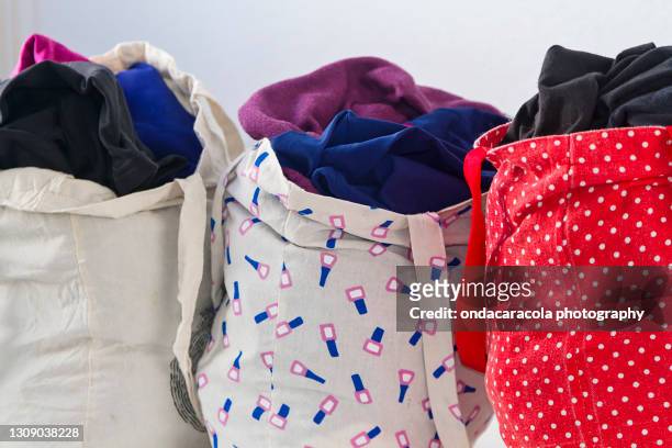 reusable cloth bags - clothing donation stock pictures, royalty-free photos & images