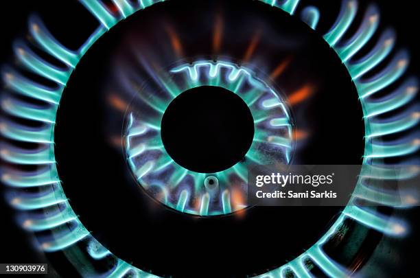 lit blue double gas ring, close-up - gas ring stock pictures, royalty-free photos & images