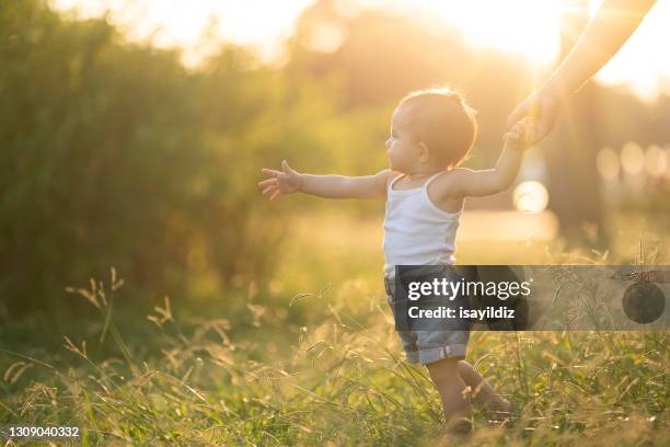 Baby First Step Photos and Premium High Res Pictures - Getty Images
